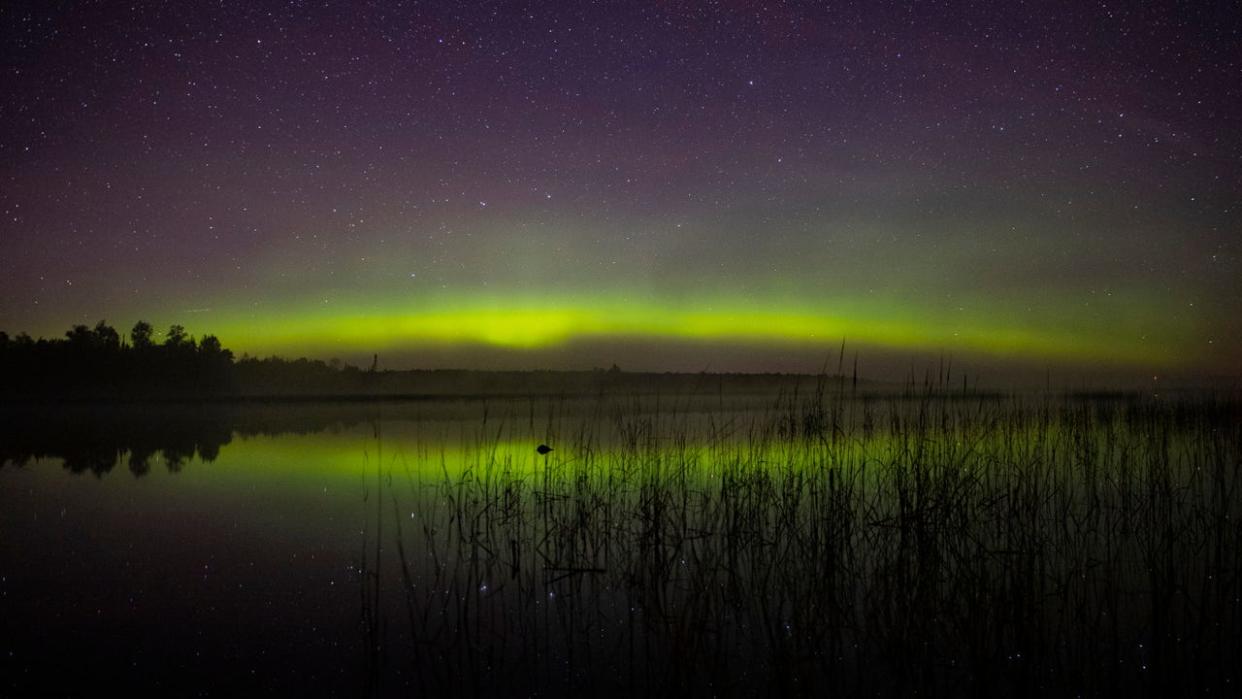 <div>The aurora borealis could be seen on the North horizon in the night sky over Wolf Lake in the Cloquet State Forest in Minnesota. The KP index was high in the early morning hours of Saturday September 28, 2019 which meant the aurora borealis aka "the Northern lights" were visible from Northern Minnesota. (Photo by Alex Kormann/Star Tribune via Getty Images)</div>