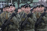Members of Kosovo Security Force line up for inspection by Kosovo president Hashim Thaci in capital Pristina, Kosovo, on Thursday, Dec. 13, 2018. Kosovo lawmakers are set to transform the Kosovo Security Force into a regular army. (AP Photo/Visar Kryeziu)