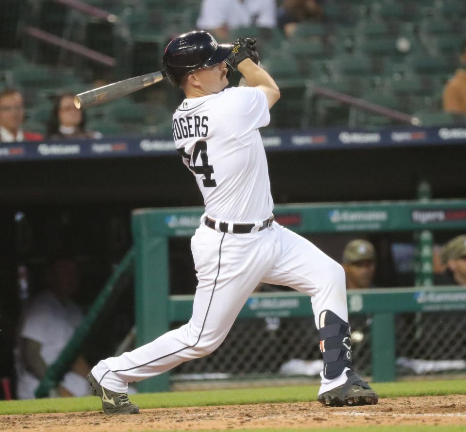 Tigers catcher Jake Rogers homers against Cubs pitcher Jake Arrieta during the sixth inning of the Tigers' 4-2 loss on Friday, May 14, 2021, at Comerica Park.