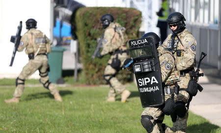 Participants of the European Union Force (EUFOR), Armed Forces, Border Police and State Investigation and Protection Agency (SIPA) of Bosnia and Herzegovina practice an anti-terrorism situation during an exercise at the Sarajevo International Airport, Bosnia and Herzegovina October 13, 2017. REUTERS/Dado Ruvic