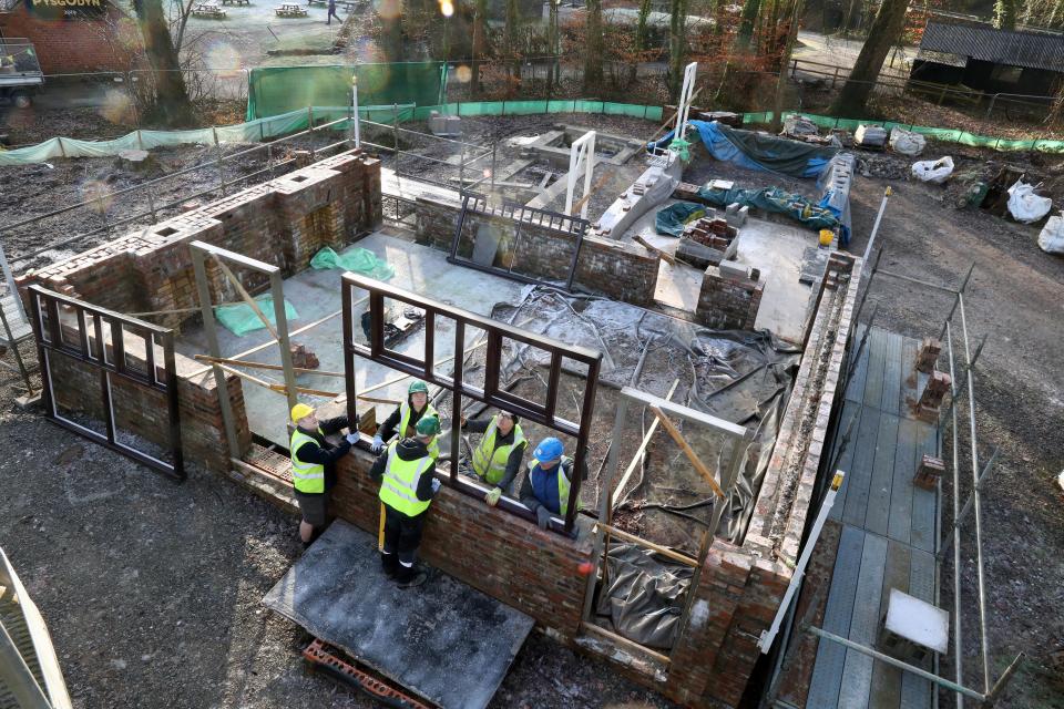 A beloved pub was knocked down - and moved brick-by-brick ten miles to be rebuilt inside a MUSEUM.  The Vulc<an pub served generations of boozers in Cardiff for more than 160 years only to be demolished for a shopper's car park.  More than 5,000 campaigners signed a petition to save it - and now their wish will come true.  Pictured here being rebuilt at St Fagans museum.  Â© WALES NEWS SERVICE    