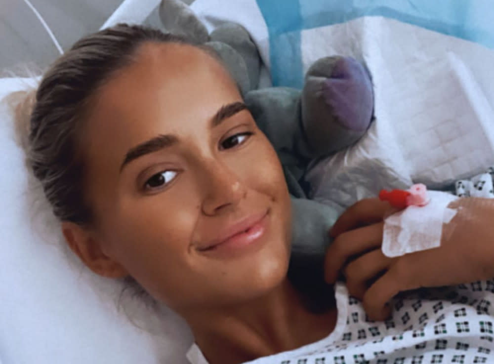 Molly-Mae Hague posted a selfie from her hospital bed after undergoing surgery to have several limps removed. (Instagram/Molly-Mae Hague)