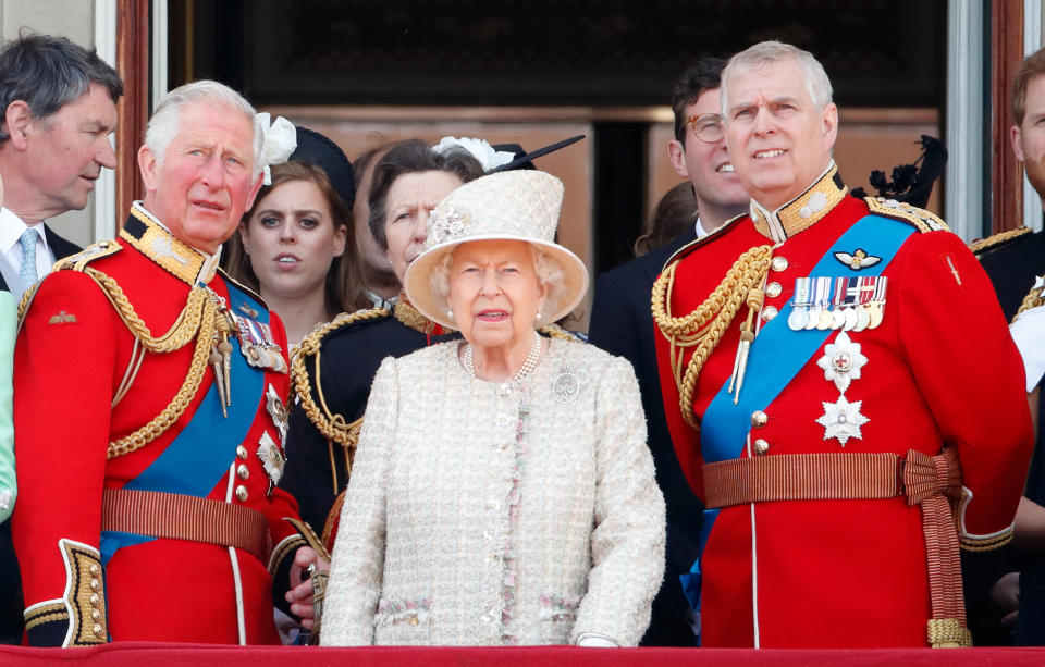 Prince Charles, Prince of Wales, Queen Elizabeth II and Prince Andrew, Duke of York watch a flypast from the balcony of Buckingham Palace during Trooping The Colour, the Queen's annual birthday parade, on June 8, 2019 in London, England.