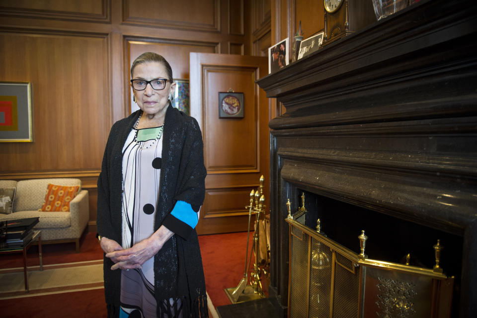 FILE - In this July 31, 2014, file photo, Associate Justice Ruth Bader Ginsburg is seen in her chambers in at the Supreme Court in Washington. The Supreme Court says Ginsburg has died of metastatic pancreatic cancer at age 87. (AP Photo/Cliff Owen, File)