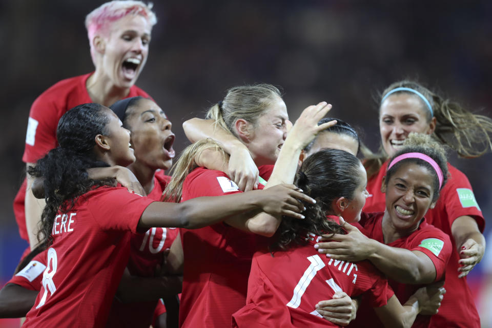 Canada's Jessie Fleming celebrates with her teammates after scoring her side's opening goal during the Women's World Cup Group E soccer match between Canada and New Zealand in Grenoble, France, Saturday, June 15, 2019. (AP Photo/Francisco Seco)