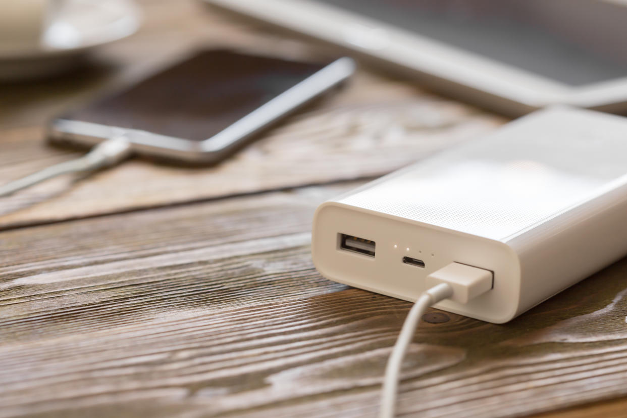 A portable power bank will keep your smart devices up and running all day, no matter where you are. (Getty Images)