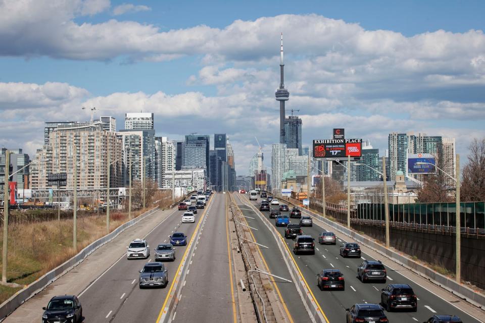 Commuters make their way through rush hour traffic on April 15, 2024 — the first day of a planned three-year-long lane reduction on the Gardiner Expressway.