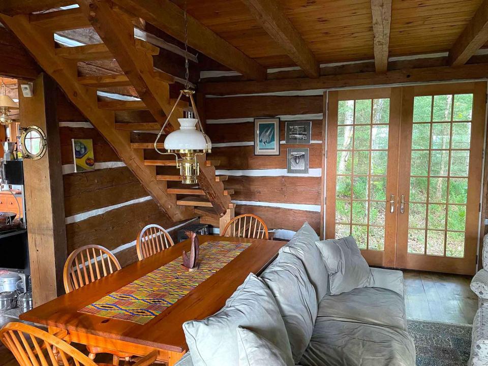 Dining table and living room in Inglis Island cottage