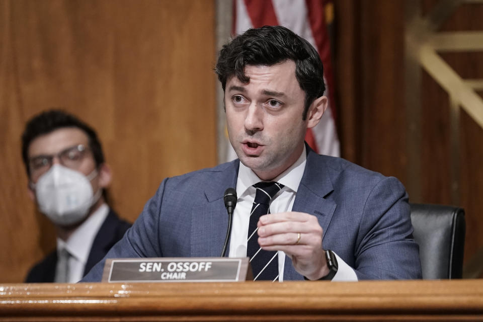 FILE- Chairman Jon Ossoff, D-Ga., questions Michael Carvajal, the outgoing director of the Federal Bureau of Prisons, as the Senate Permanent Subcommittee On Investigations holds a hearing on charges of corruption and misconduct at the U.S. Penitentiary in Atlanta, at the Capitol in Washington, July 26, 2022. (AP Photo/J. Scott Applewhite, File)