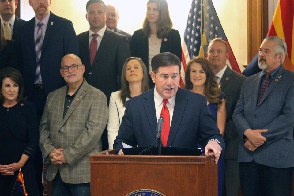 Arizona Gov. Doug Ducey speaks before members of the state Legislature and others before signing what he and others say is the most significant water legislation in 40 years in Phoenix, Wednesday, July 6, 2022. Climate change and a nearly 30-year drought forced Arizona to come up with the $1.2 billion plan to augment water supplies and boost conservation efforts.