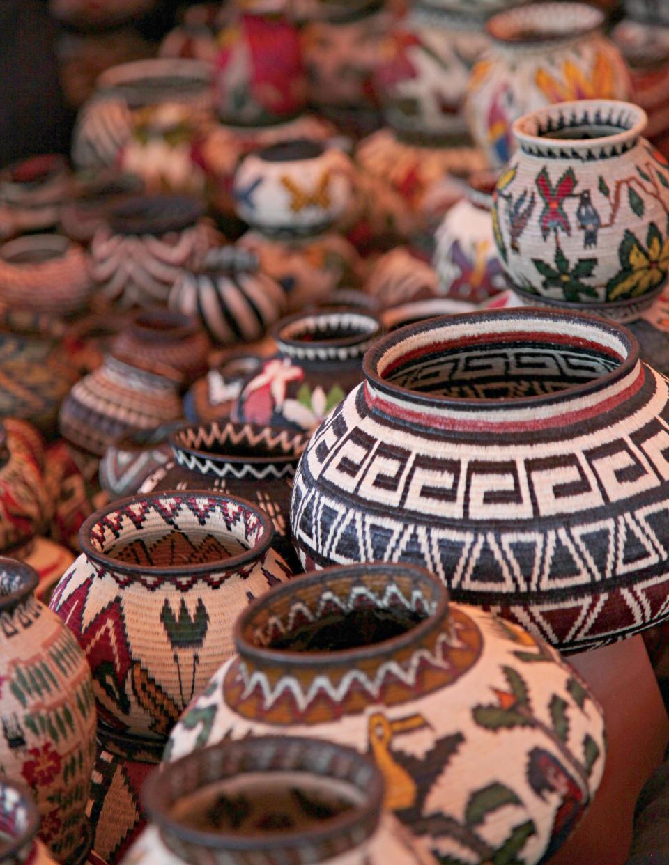 This 2011 photo provided by the Santa Fe International Folk Art Market shows handwoven baskets from the Wounaan National Congress in Panama. The basketmakers are scheduled to bring their wares back to this year’s market in Santa Fe, N.M., scheduled for July 13-15. (AP Photo/Santa Fe International Folk Art Market, Stephanie Mendez)