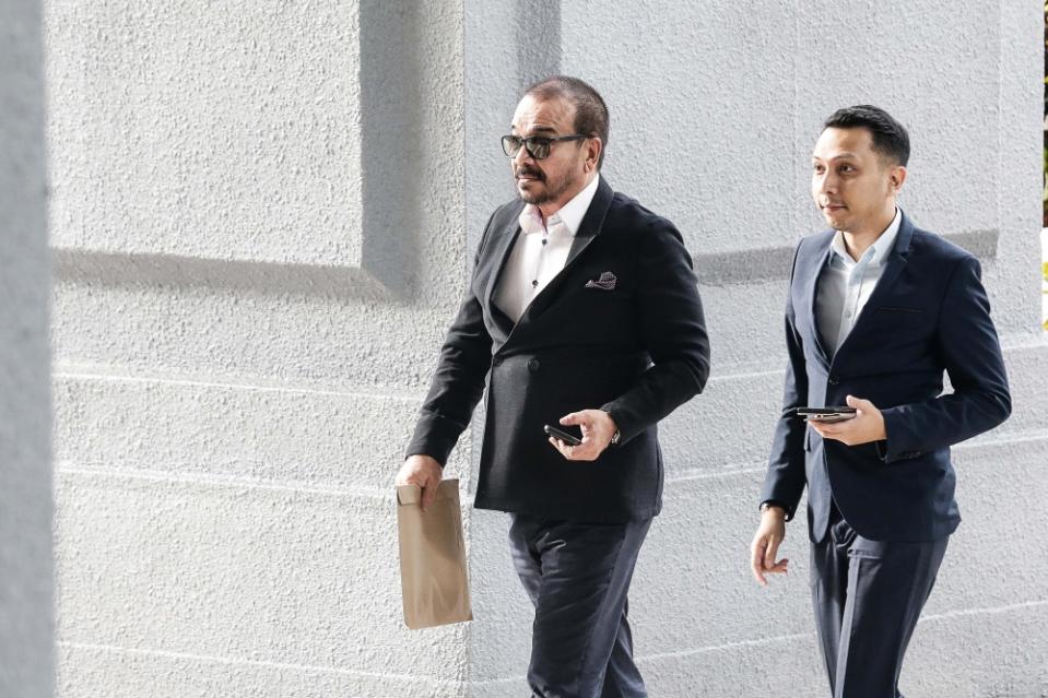 Datuk Seri Khalid Mohamad Jiwa arrives at the Kuala Lumpur High Court August 21, 2023. — Picture by Sayuti Zainudin