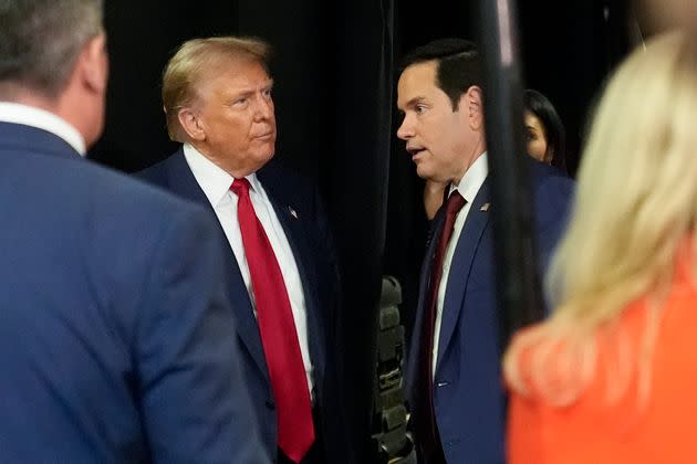 Former President Donald Trump speaks with Sen. Marco Rubio (R-Fla.) in the spin room after the ABC News presidential debate on Tuesday. Trump praised his own performance in the debate to reporters.