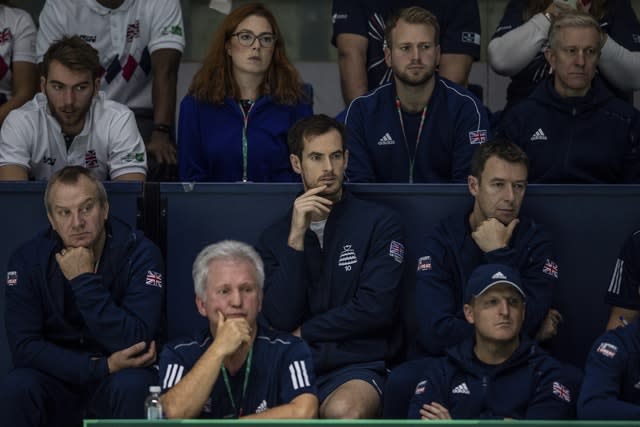 Andy Murray, centre, watched from the stands on Thursday