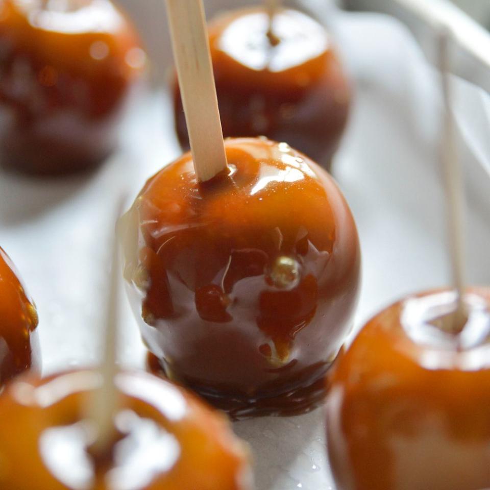 <p>A toffee apple is a classic Bonfire Night or autumnal treat. This apple recipe only needs three ingredients.</p><p><strong>Recipe: <a href="https://www.goodhousekeeping.com/uk/food/recipes/a537868/toffee-apples/" rel="nofollow noopener" target="_blank" data-ylk="slk:Toffee apples;elm:context_link;itc:0;sec:content-canvas" class="link ">Toffee apples</a></strong></p>