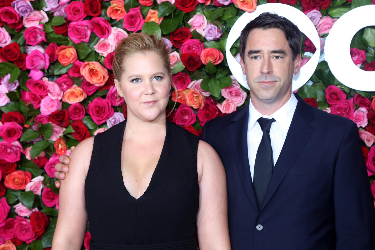 Amy Schumer and husband Chris Fischer are expecting their first child. (Photo: Bruce Glikas/FilmMagic)