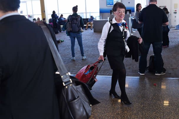 PHOTO: In this Dec. 19, 2017, file photo, American Airlines longest serving flight attendant, Bette Nash, 81 years old, walks in the airport after disembarking from her daily return flight to Boston at Ronald Reagan Washington Airport in Arlington, Va. (Eric Baradat/AFP via Getty Images, FILE)