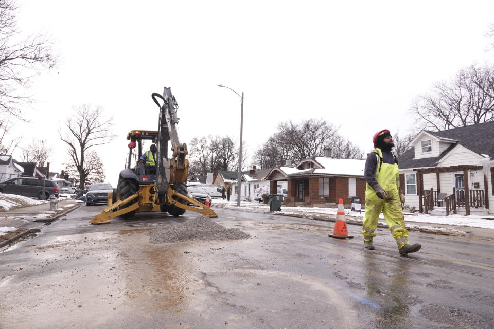 Memphis Light Gas & Water makes repairs to a broken water main in north Memphis, Tenn., Monday, Jan. 22, 2024. Memphis and the surrounding area has endured a week of sub-freezing temperatures, snow and ice. (AP Photo/Karen Pulfer Focht)