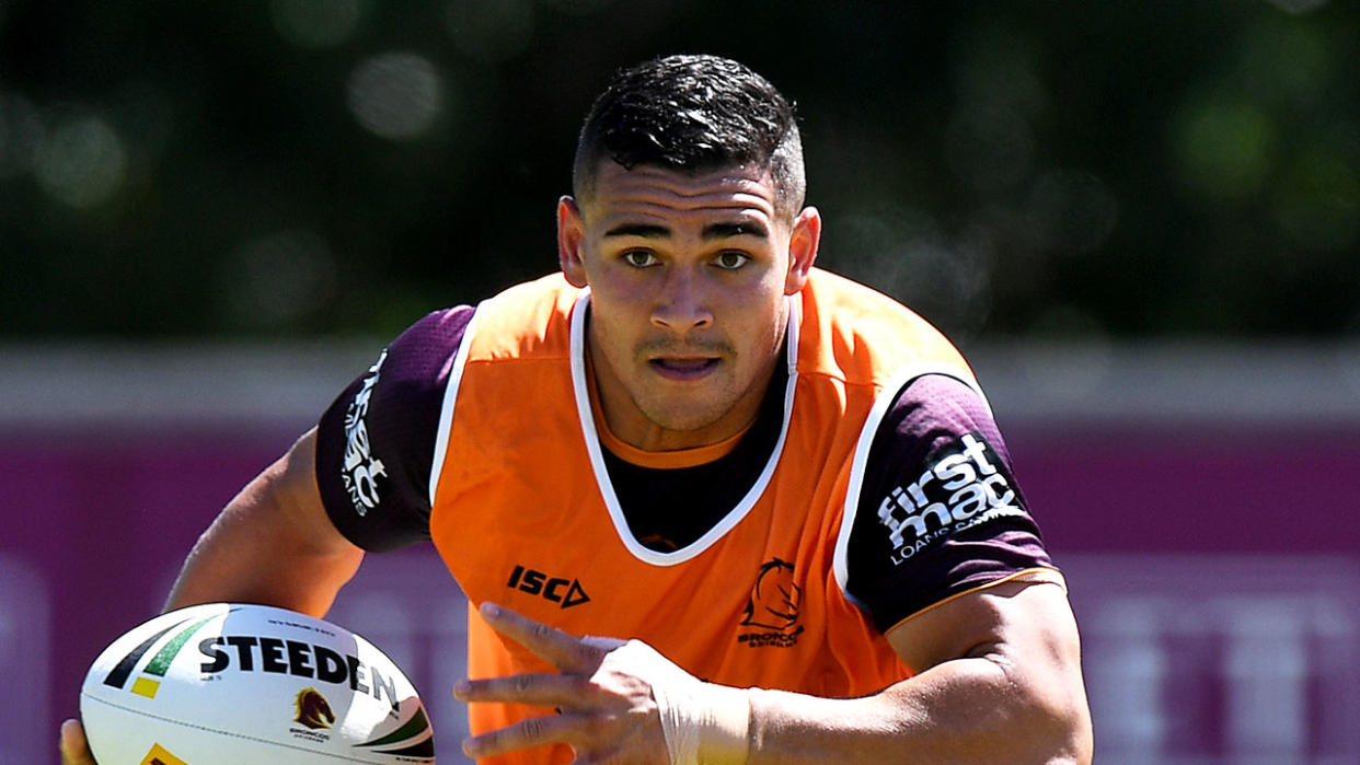 Izaia Perese runs with the ball during a Brisbane Broncos NRL Training Session. (Photo by Bradley Kanaris/Getty Images)