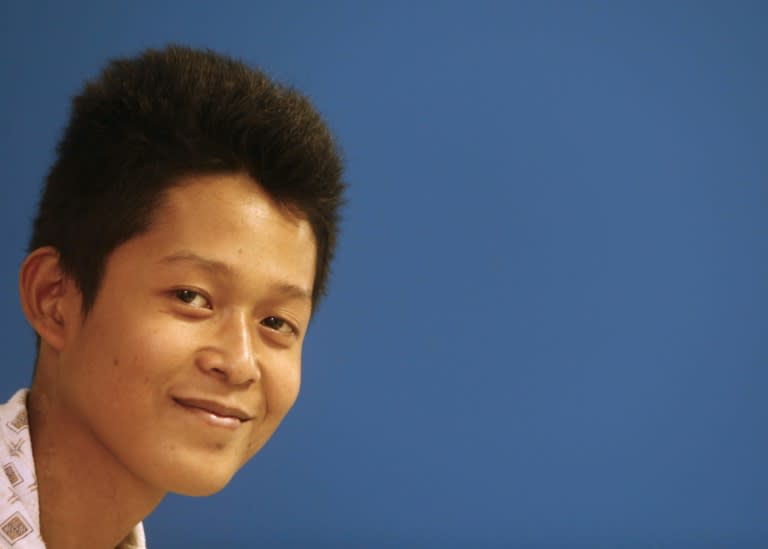 Filipino teen Reynaldo Nilo sits in a hospital room in the Sudanese capital, Khartoum, on July 1, 2015