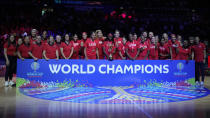 Gold medalists the United States pose for photo after defeating China in the final at the women's Basketball World Cup in Sydney, Australia, Saturday, Oct. 1, 2022. (AP Photo/Mark Baker)