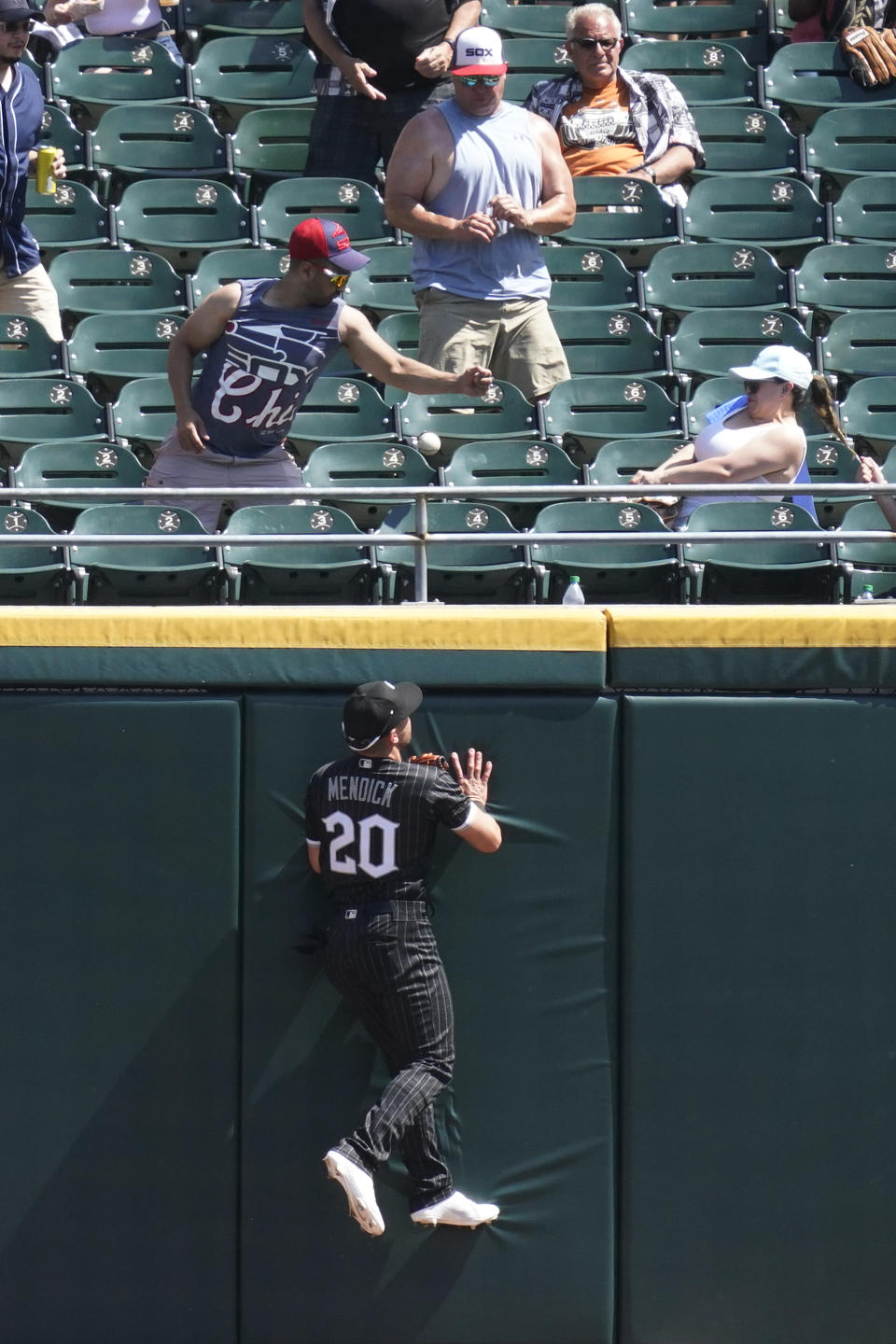 Chicago White Sox center fielder Danny Mendick can't make the play on a solo home run hit by Detroit Tigers' Miguel Cabrera during the sixth inning of a baseball game in Chicago, Saturday, June 5, 2021. (AP Photo/Nam Y. Huh)