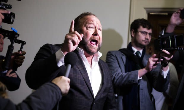 Alex Jones, addresses media inside the Rayburn House Office Building, ahead of a House Judiciary Hearing with testimony from Google CEO Sundar Pichai, December 11, 2018.