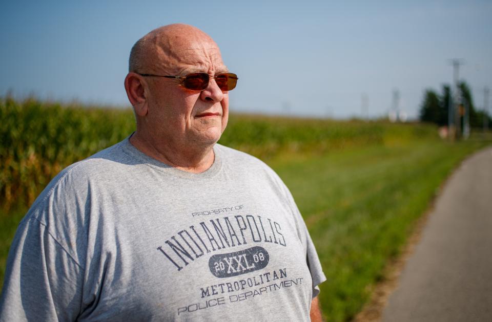 On Aug. 19, 2019, retired law enforcement officer Gary Maxey looks out at the cornfield where he and other law enforcement officers and medical personnel found the youngest of the three Slasher victims, Sheri, exactly 44 years earlier.