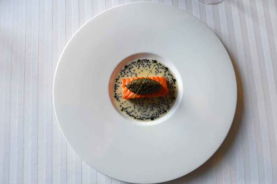 <p>Delicate salmon prepared “mi cuit” (sous vide in a salt bath that creates a decadent texture) is a luxury rarely seen in restaurants, except at <a href="https://www.tripadvisor.com/Restaurant_Review-g45963-d650768-Reviews-Restaurant_Guy_Savoy-Las_Vegas_Nevada.html" rel="nofollow noopener" target="_blank" data-ylk="slk:Guy Savoy;elm:context_link;itc:0;sec:content-canvas" class="link ">Guy Savoy</a>. The French institution serves the fish atop a luscious beurre blanc, and is garnished with a dollop of Ossetra caviar, aka one of the world’s finest caviars.</p>