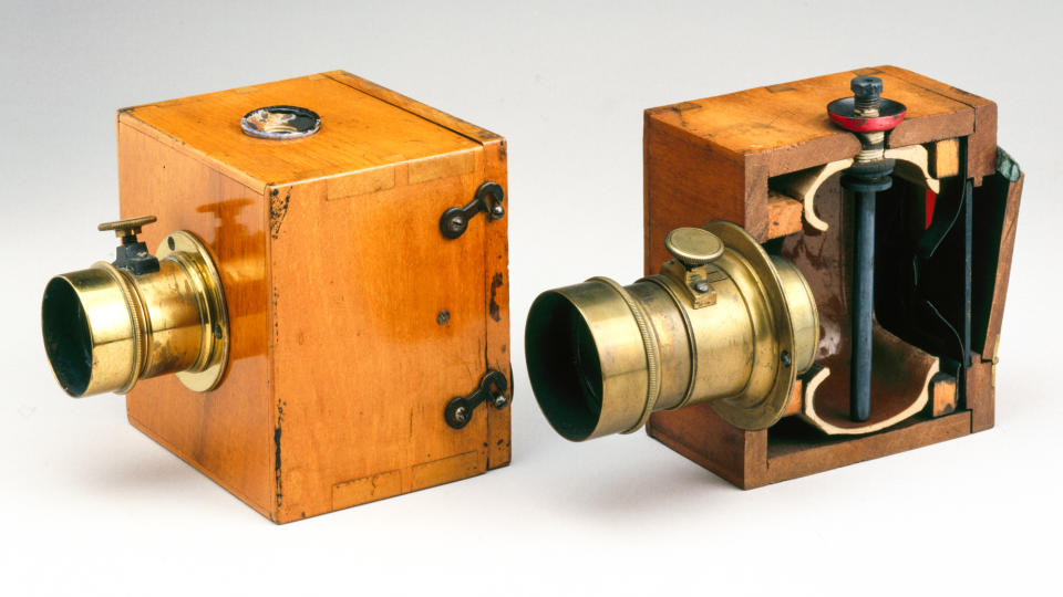 Dubroni wet-plate cameras were the first cameras which allowed the photographic plates to be sensitised, exposed, developed and fixed within the camera body, the chemicals being introduced by means of the rubber bulb and tube. One of these cameras is shown sectioned to reveal the earthenware container encased within it. The camera was very popular in Europe because of its convenience. The name Dubroni is an anagram of the surname of the camera�s patentee, Jules Bourdin (1832-1893). (Photo by SSPL/Getty Images)