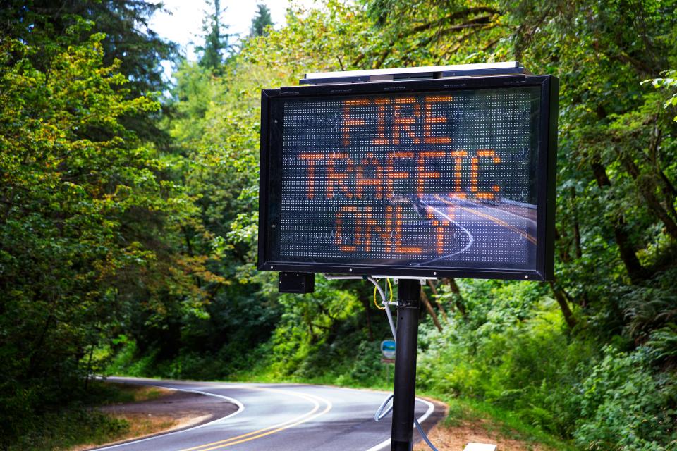 Big Fall Creek Road is closed at the intersection of Peninsula Road for the Bedrock Fire east of Eugene on July 24.