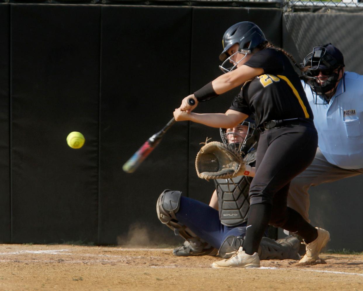 St. John Vianney's Gabby Gonzalez (#20) connects with the ball during game against Freehold Township at home Monday, May 15, 2023.  