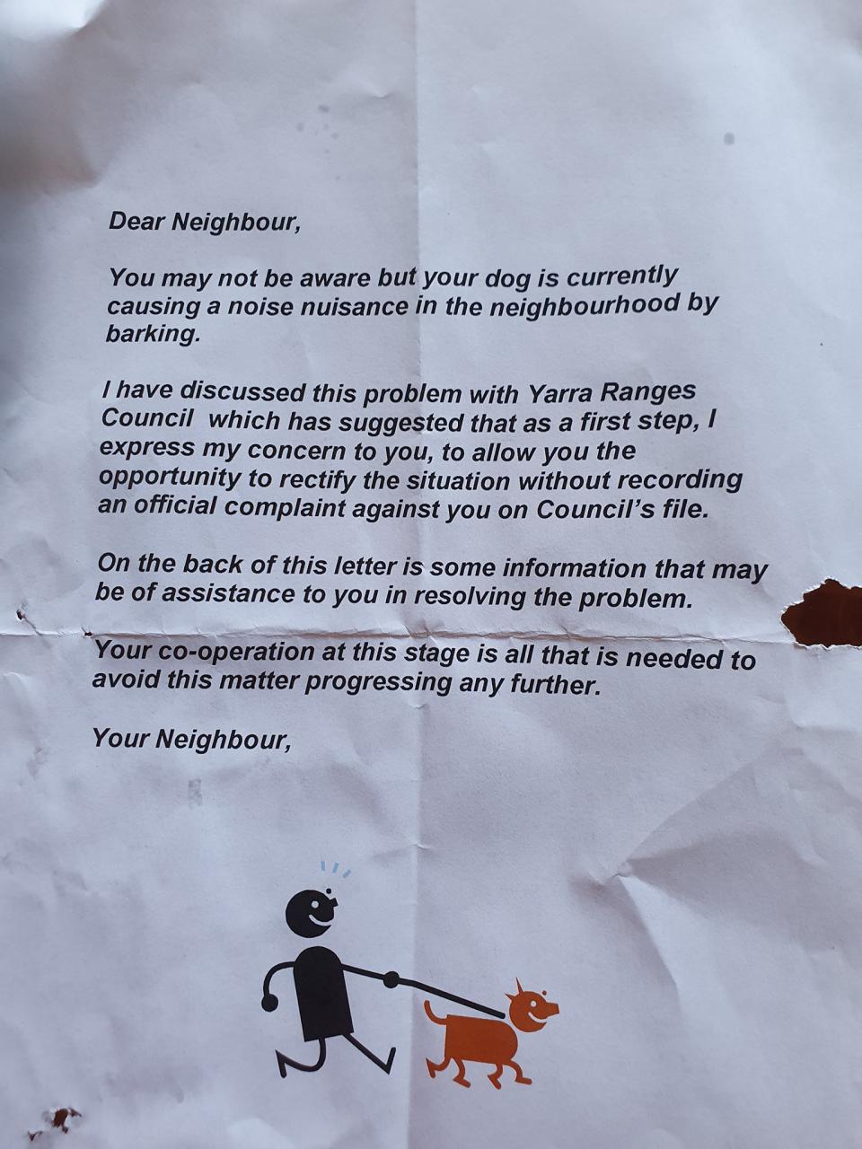 A note from a neighbour complaining about a barking dog.