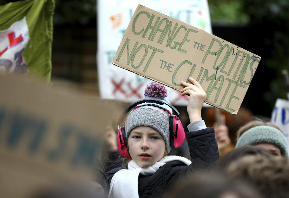 Students take part in a global school strike for climate change in Canterbury, south east England, Friday March 15, 2019. Students mobilized by word of mouth and social media skipped class Friday to protest what they believe are their governments’ failure to take though action against global warming. (Gareth Fuller/PA via AP)