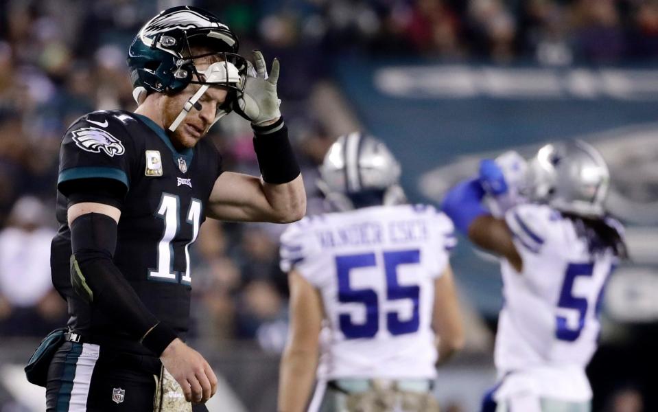 Carson Wentz might miss out on a chance to go to the playoffs for the second year running - AP