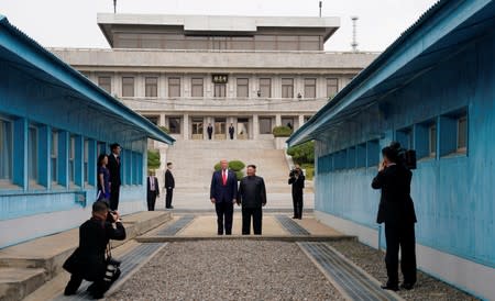 Trump meets with North Korean leader Kim Jong Un at the DMZ on the border of North and South Korea