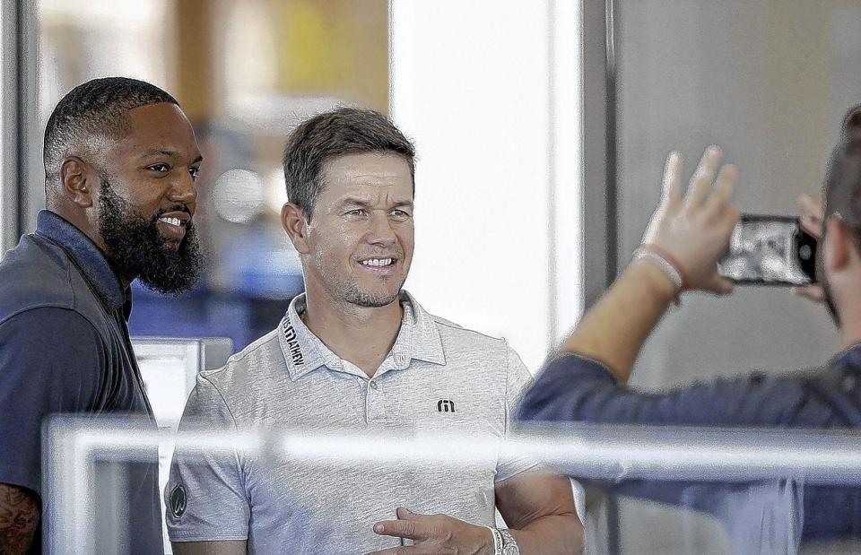 Mark Wahlberg posed for a photo with Justin Luckett in August 2019 at Mark Wahlberg Chevrolet in Columbus. Wahlberg also owns a dealership in Avon, Ohio.
