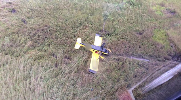 The plane had tried to make an emergency landing but ended up overturned on boggy ground. Source: Supplied, CareFlight Top End