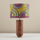 <p>Bespoke Binny </p><p><strong>$50.00</strong></p><p><a href="https://bespokebinny.com/collections/lampshades/products/african-wax-print-drum-lampshade-pink-yellow-sunshine" rel="nofollow noopener" target="_blank" data-ylk="slk:Shop Now;elm:context_link;itc:0" class="link ">Shop Now</a></p><p>Energize your room with one of Bespoke Binny's African-print lamp shades. Founded by Natalie Manima, the name comes from "bespoke" (highlighting that Manima's products are made to order) and "Binny" (a nickname coined from her Ghanaian middle name Obenewa). Other items include decorative table runners, patterned aprons and oven gloves. </p><p><a href="https://www.goodhousekeeping.com/life/inspirational-stories/a41755620/bespoke-binny-natalie-manima-interview/" rel="nofollow noopener" target="_blank" data-ylk="slk:Learn more about Bespoke Binny »;elm:context_link;itc:0" class="link "><em>Learn more about Bespoke Binny »</em></a></p>