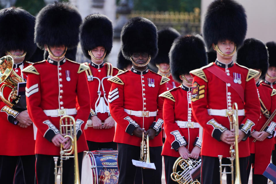 <p>Soldiers from the 1st Battalion Coldstream Guards take part in the Changing of the Guard in the forecourt of Buckingham Palace, London. Picture date: Monday October 4, 2021.</p>
