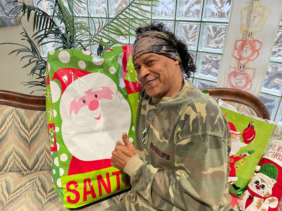 Christmas isn’t over for actor Cylk Cozart at his studio on Middlebrook Pike Tuesday, Jan. 3, 2023.