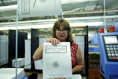 President Donald Trump's FY2018 budget is seen during printing process at the Government Publishing Office in Washington, U.S., May 19, 2017. REUTERS/Yuri Gripas