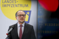 Austrian Chancellor Alexander Schallenberg talks at a press conference in Tulln, Austria, Wednesday, Dec. 1, 2021. Austria’s lockdown has officially been extended until Dec. 11 as planned amid signs that the measures are helping to bring down a sky-high coronavirus infection rate. A parliamentary committee signed off Tuesday on the extension of the country’s fourth national lockdown of the pandemic that started on Nov. 22. (AP Photo/Lisa Leutner)