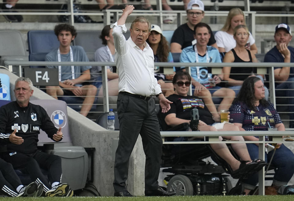 Minnesota United head coach Adrian Heath, center, reacts during the first half of an MLS soccer match against the Portland Timbers, Saturday, July 1, 2023, in St. Paul, Minn. (AP Photo/Abbie Parr)