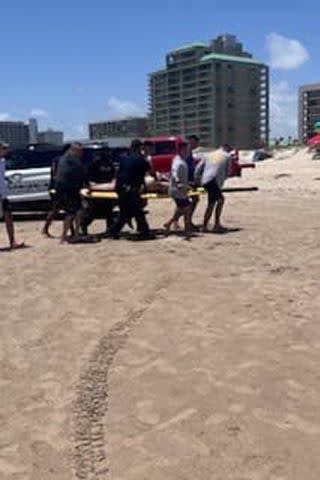 <p>United States Border Patrol's Laredo Sector.</p> One of the shark attack victims is stretchered off the beach