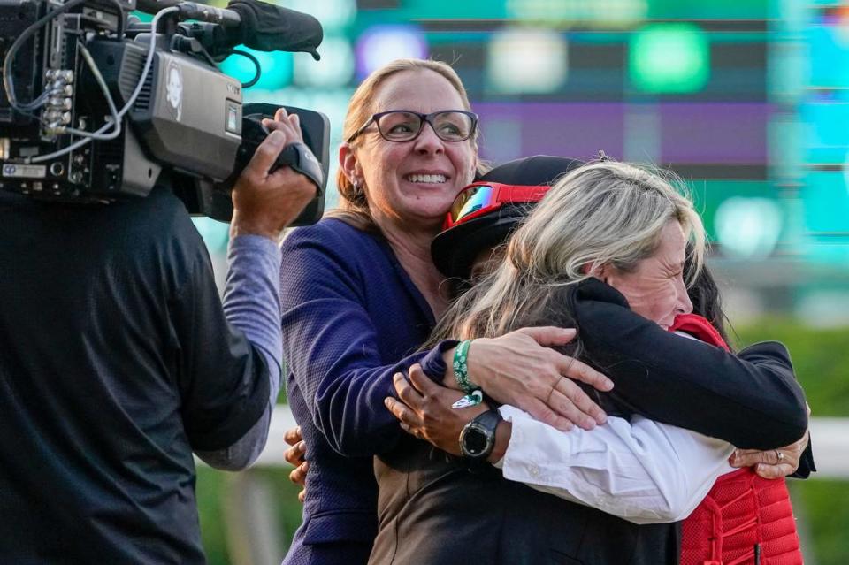 Trainer Jena Antonucci, left with glasses, celebrates after Arcangelo won the 155th running of the Belmont Stakes on Saturday at Belmont Park in Elmont, N.Y.