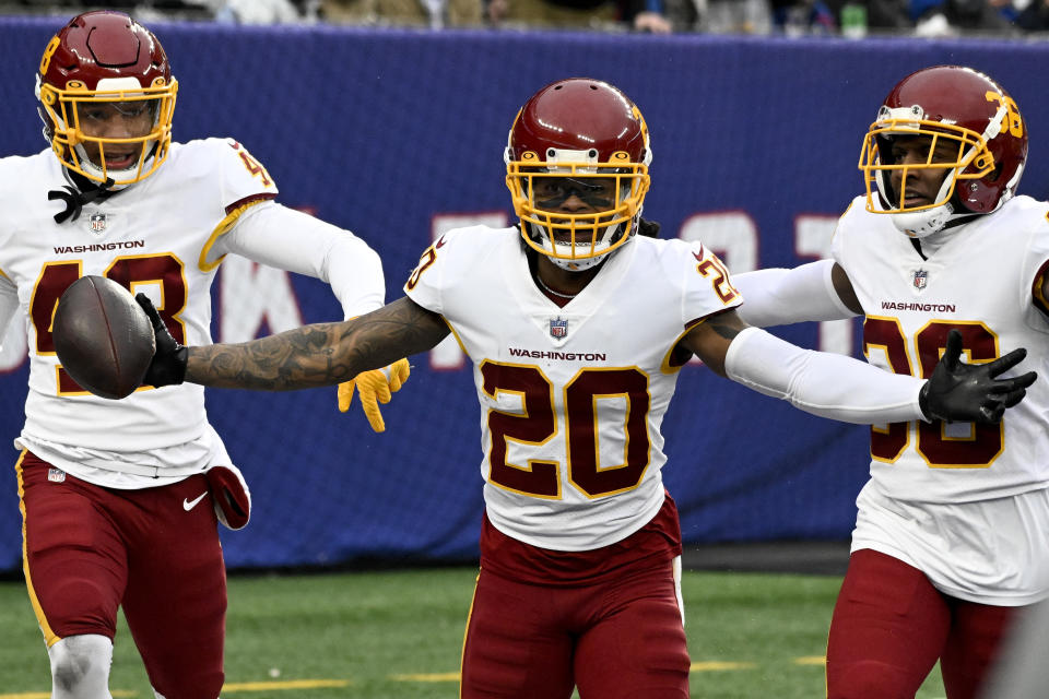 Washington Football Team cornerback Bobby McCain (20) reacts after returning an interception for a touchdown against the New York Giants during the third quarter of an NFL football game, Saturday, Jan. 9, 2021, in East Rutherford, N.J. (AP Photo/Bill Kostroun)