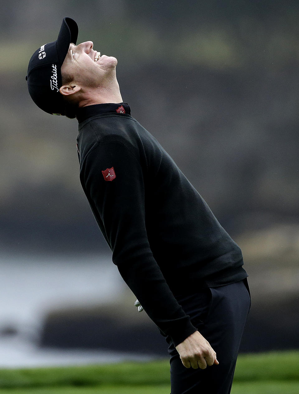 Jimmy Walker celebrates on the 18th green on Sunday, Feb. 9, 2014, after winning the AT&T Pebble Beach Pro-Am golf tournament in Pebble Beach, Calif. (AP Photo/Ben Margot)