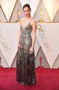 <p>Wonder Woman actress Gal Gadot brings old Hollywood glamour to the Oscars carpet, wearing a stunning fringed silver gown designed by Givenchy and Tiffany & Co necklace.</p>