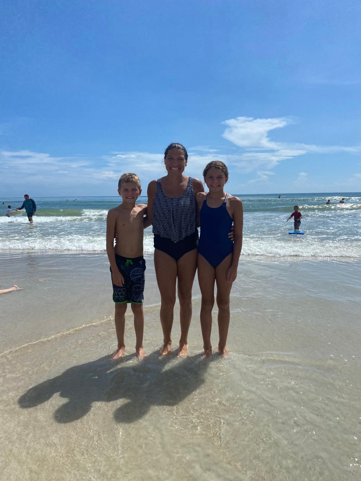 Cyrus and Piper Blakney, pictured with their mother, Racheal, were avid swimmers.